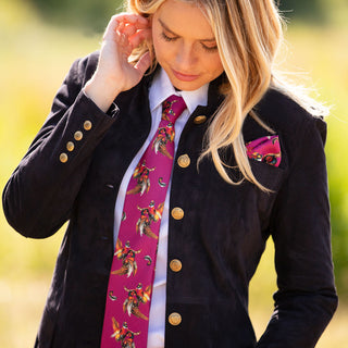 I just had to add Dreams Come True into my Tie Collection as it really is the most exquisite and joyful print and works wonderfully with dual colour silks. I particularly love ties as they embody timeless luxury yet also feel fresh and modern, encouraging the wearer to be bold and daring. Their transformative power is undeniable; try adding to a favourite outfit to discover it for yourself. Dreams Can Come True makes its long-awaited debut into the Clare Haggas 2022 Tie Collection and what an entrance.