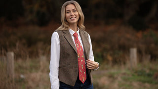 Ladies silk ties and cravats, shown here in an equestrian horse design in forest green