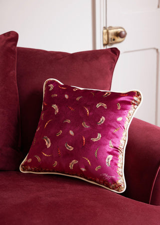 Floating Feather Small Piped Plush Velvet Cushion in Mulberry Red
