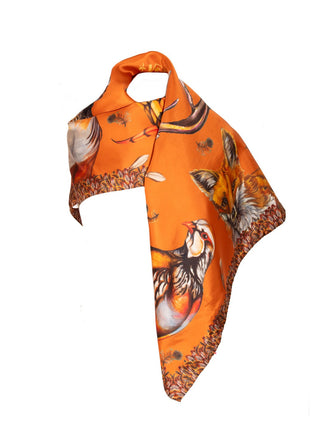 Orange scarf with bird pattern on a white background