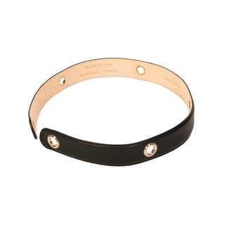 Black and rose gold leather scarf belt on a white background